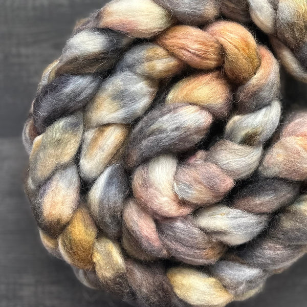 70% untreated BFL, 30% bright trilobal nylon inspired by Precious Rock colourway